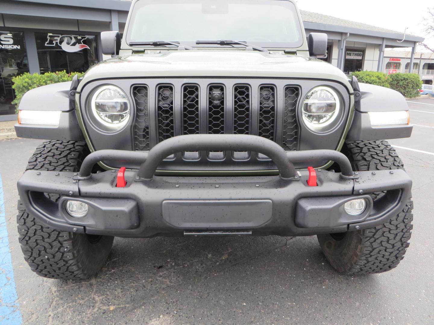 2021 Sarge Green /BLACK Jeep Wrangler Rubicon (1C4HJXCN4MW) with an 2.0L L4 DOHC 16V TURBO engine, 6A transmission, located at 2630 Grass Valley Highway, Auburn, CA, 95603, (530) 508-5100, 38.937893, -121.095482 - Rubicon featuring a Mopar suspension system, Fox shocks, 17" Fuel Wheels, BFG KO2 tires, Maxximus 3 front bumper stinger, Dual exhaust, Bolt hitch lock, Mopar HD tailgate hinge, and a custom cargo platform. - Photo#10